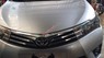 Toyota Corolla altis 1.8AT 2015 - Cần bán xe Toyota Corolla Altis 1.8AT đời 2015, màu bạc số tự động, giá cực tốt