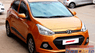 Hyundai i10 1.0AT 2014 - Bán ô tô Hyundai i10 1.0AT đời 2014, màu vàng, nhập khẩu nguyên chiếc, số tự động giá cạnh tranh