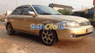 Ford Laser  Ghia 2003 - Cần bán xe Ford Laser Ghia đời 2003, màu vàng, nhập khẩu chính hãng, giá 245tr
