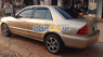 Ford Laser  Ghia 2003 - Cần bán xe Ford Laser Ghia đời 2003, màu vàng, nhập khẩu chính hãng, giá 245tr
