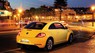 Volkswagen Beetle E 2016 - Cần bán xe Volkswagen Beetle E 2016, màu vàng, nhập khẩu nguyên chiếc