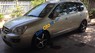 Kia Carens   2010 - Bán xe Kia Carens đời 2010, màu vàng số tự động