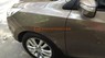 Hyundai Tucson 2012 - Cần bán xe Hyundai Tucson AT 4WD 2O12 màu nâu