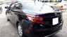 Toyota Vios 1.5E 2014 - Bán xe cũ Toyota Vios 1.5E đời 2014, màu đen số sàn