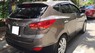 Hyundai Tucson 2012 - Cần bán xe Hyundai Tucson AT 4WD 2O12 màu nâu