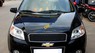 Chevrolet Aveo LTZ 1.5AT 2014 - Cần bán gấp Chevrolet Aveo LTZ 1.5AT đời 2014, màu đen số tự động