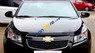 Chevrolet Cruze LS 1.6MT 2014 - Cần bán gấp Chevrolet Cruze LS 1.6MT sản xuất 2014, màu đen số sàn, giá tốt