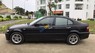 BMW 3 Series  318i 2005 - Cần bán gấp BMW 3 Series 318i 2005, màu đen xe gia đình, giá chỉ 362 triệu