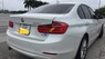 BMW 3 Series  320i 2014 - Cần bán xe BMW 3 Series 320i đời 2014, màu trắng, xe nhập chính chủ