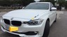 BMW 3 Series  320i 2014 - Cần bán xe BMW 3 Series 320i đời 2014, màu trắng, xe nhập chính chủ