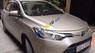Toyota Vios 1.5E 2014 - Bán Toyota Vios 1.5E năm sản xuất 2014, màu vàng