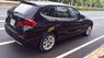 BMW X1 2.0AT 2011 - Cần bán lại xe BMW X1 2.0AT năm 2011, màu đen, nhập khẩu