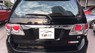 Toyota Fortuner  V 2.7AT  2014 - Bán Toyota Fortuner V 2.7AT sản xuất 2014, màu đen, số tự động, 895 triệu