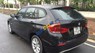 BMW X1   2.0AT 2011 - Bán xe BMW X1 2.0AT sản xuất năm 2011, màu đen, xe nhập