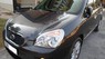 Kia Carens EX 2.0MT 2012 - Cần bán lại xe Kia Carens EX 2.0MT sản xuất 2012, màu đen, giá tốt