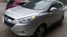 Hyundai Tucson 2.0AT 2010 - Cần bán gấp Hyundai Tucson 2.0AT năm sản xuất 2010, màu bạc, nhập khẩu nguyên chiếc