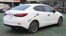 Mazda 2 1.5AT 2015 - Cần bán Mazda 2 1.5AT sản xuất 2015, màu trắng số tự động, 554 triệu