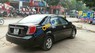 Daewoo Lacetti  MT 2011 - Bán Daewoo Lacetti MT sản xuất 2011, màu đen