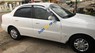 Daewoo Lanos SX 2002 - Cần bán lại xe Daewoo Lanos SX sản xuất 2002, màu trắng