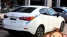 Mazda 2 2015 - Cần bán gấp Mazda 2 đời 2015, màu trắng, xe mới đẹp như trong hình, còn bảo hành đầy đủ