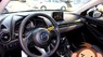 Mazda 2 2015 - Cần bán gấp Mazda 2 đời 2015, màu trắng, xe mới đẹp như trong hình, còn bảo hành đầy đủ