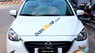 Mazda 2 2015 - Cần bán gấp Mazda 2 đời 2015, màu trắng, xe mới đẹp như trong hình, còn bảo hành đầy đủ