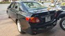 Toyota Corolla XLi 2008 - Cần bán Toyota Corolla XLi sản xuất năm 2008, màu đen, nhập khẩu nguyên chiếc