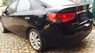 Kia Cerato 1.6AT 2009 - Cần bán lại xe Kia Cerato 1.6AT sản xuất năm 2009, màu đen, nhập khẩu