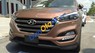 Hyundai Santa Fe 2016 - Cần bán Hyundai Santa Fe sản xuất 2016, màu nâu