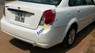 Daewoo Lacetti EX 2004 - Cần bán gấp Daewoo Lacetti EX sản xuất 2004, màu trắng còn mới, 188tr