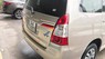 Toyota Innova E 2016 - Cần bán lại xe Toyota Innova E năm 2016, màu vàng số sàn