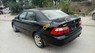 Mazda 626   Clacssic   2003 - Cần bán lại xe Mazda 626 Clacssic sản xuất năm 2003, màu đen xe gia đình