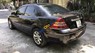 Ford Mondeo 2.5AT 2005 - Bán Ford Mondeo 2.5V6 màu đen, đăng ký 2005, form mới đèn 2 sọc