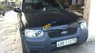 Ford Escape  2.0 2003 - Cần bán gấp Ford Escape 2.0 năm sản xuất 2003, màu đen, đi 130000 km, máy móc vận hành tốt