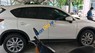 Mazda CX 5   2015 - Bán xe cũ Mazda CX 5 đời 2015, màu trắng, xe đẹp còn rất mới, thân vỏ đẹp, chắc chắn