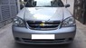 Chevrolet Lacetti 2014 - Bán Chevrolet Lacetti sản xuất năm 2014, màu bạc xe gia đình