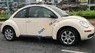 Volkswagen Beetle 2010 - Cần bán xe Volkswagen Beetle sản xuất năm 2010, màu kem (be), xe một đời chủ