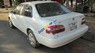 Toyota Corolla 2001 - Bán Toyota Corolla sản xuất năm 2001, màu trắng xe gia đình