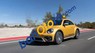 Volkswagen Beetle 2016 - Bán xe Volkswagen Beetle năm 2016, màu vàng, xe nhập