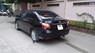 Toyota Vios E 2011 - Cần bán xe Toyota Vios E năm sản xuất 2011, màu đen, 357 triệu