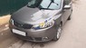 Kia Forte SX 1.6AT 2011 - Bán xe Kia Forte SX 1.6AT sản xuất năm 2011, màu xám