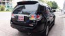 Toyota Fortuner V 4x2AT 2014 - Cần bán lại xe Toyota Fortuner V 4x2AT sản xuất năm 2014, màu đen, 840 triệu