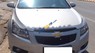 Chevrolet Cruze 1.6MT 2012 - Cần bán xe Chevrolet Cruze 1.6MT sản xuất năm 2012, màu bạc giá cạnh tranh