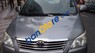 Toyota Innova E 2012 - Cần bán lại xe Toyota Innova E sản xuất 2012, màu bạc, giá tốt
