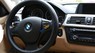 BMW 3 Series 320i 2012 - Cần bán lại xe BMW 3 Series 320i sản xuất năm 2012, màu đen, xe nhập đã đi 88000 km
