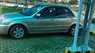 Ford Laser GHIA 1.8 2002 - Cần bán Ford Laser GHIA 1.8 sản xuất 2002, màu vàng