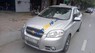 Chevrolet Aveo   2011 - Cần bán Chevrolet Aveo sản xuất 2011, màu bạc