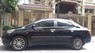 Toyota Vios E 2012 - Cần bán gấp Toyota Vios E 2012, màu đen
