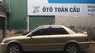 Ford Laser Ghia 1.8MT 2002 - Bán ô tô Ford Laser Ghia 1.8MT năm sản xuất 2002, màu vàng, 205 triệu