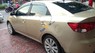 Kia Cerato 1.6 2009 - Bán Kia Cerato 1.6 năm 2009, màu vàng, nhập khẩu như mới